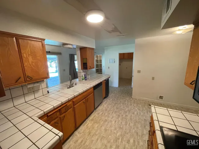 a large bathroom with a double vanity sink and a mirror