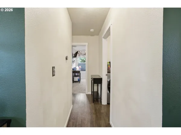 a view of entryway with wooden floor