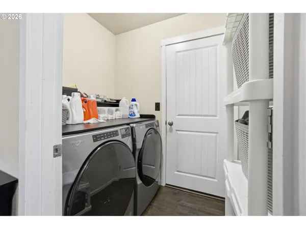 a utility room with dryer and washer