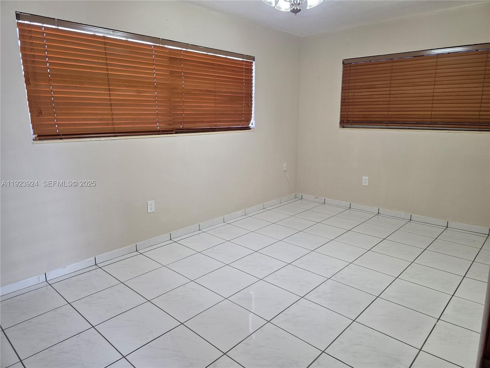 1560 West 53rd Terrace, Unit 1560 Hialeah, FL 33012 - Photo 18 of 28 a view of a room