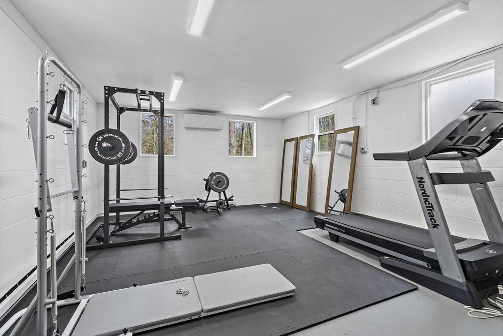 33 Turning Mill Road Lexington, MA 02420 - Photo 35 of 42 a view of a room with gym equipment