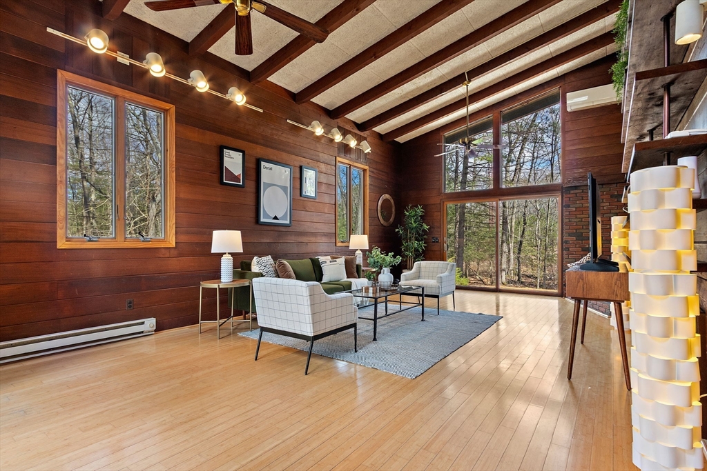 33 Turning Mill Road Lexington, MA 02420 - Photo 4 of 42 a living room with furniture and a floor to ceiling window
