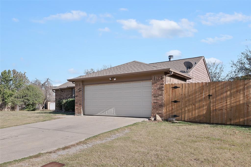 3521 Glenview Drive Corinth, TX 76210 - Photo 22 of 24 a view of a house with a backyard
