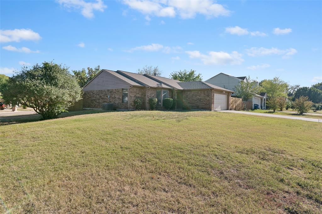 3521 Glenview Drive Corinth, TX 76210 - Photo 23 of 24 a view of a house with a yard