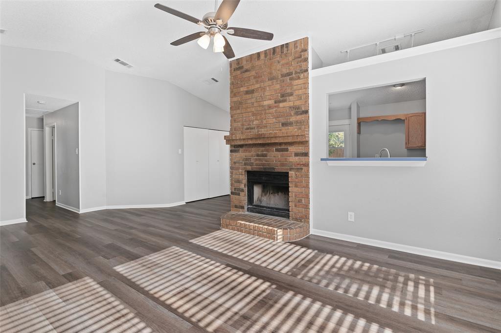 3521 Glenview Drive Corinth, TX 76210 - Photo 2 of 24 a view of a livingroom with a fireplace