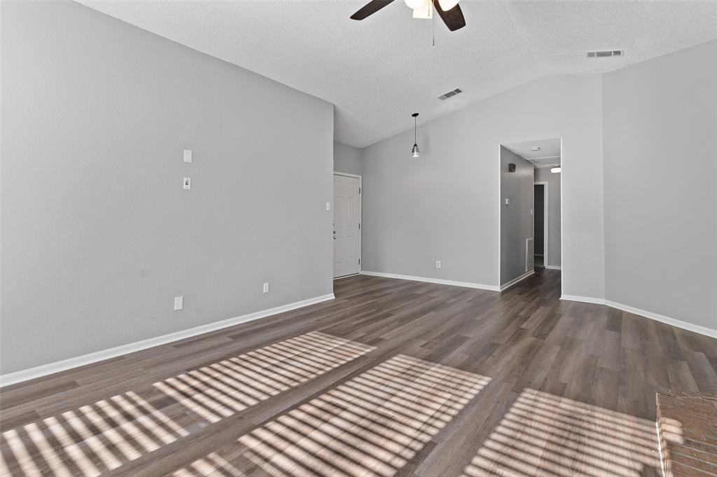 3521 Glenview Drive Corinth, TX 76210 - Photo 3 of 24 wooden floor in an empty room