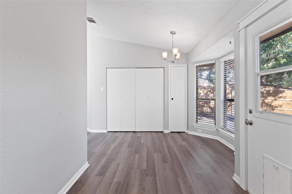3521 Glenview Drive Corinth, TX 76210 - Photo 8 of 24 wooden floor in an empty room with a window