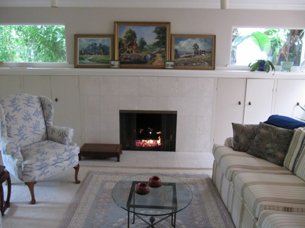 2184 East Valley Road Montecito, CA 93108 - Photo 2 of 5 a living room with furniture and a fireplace