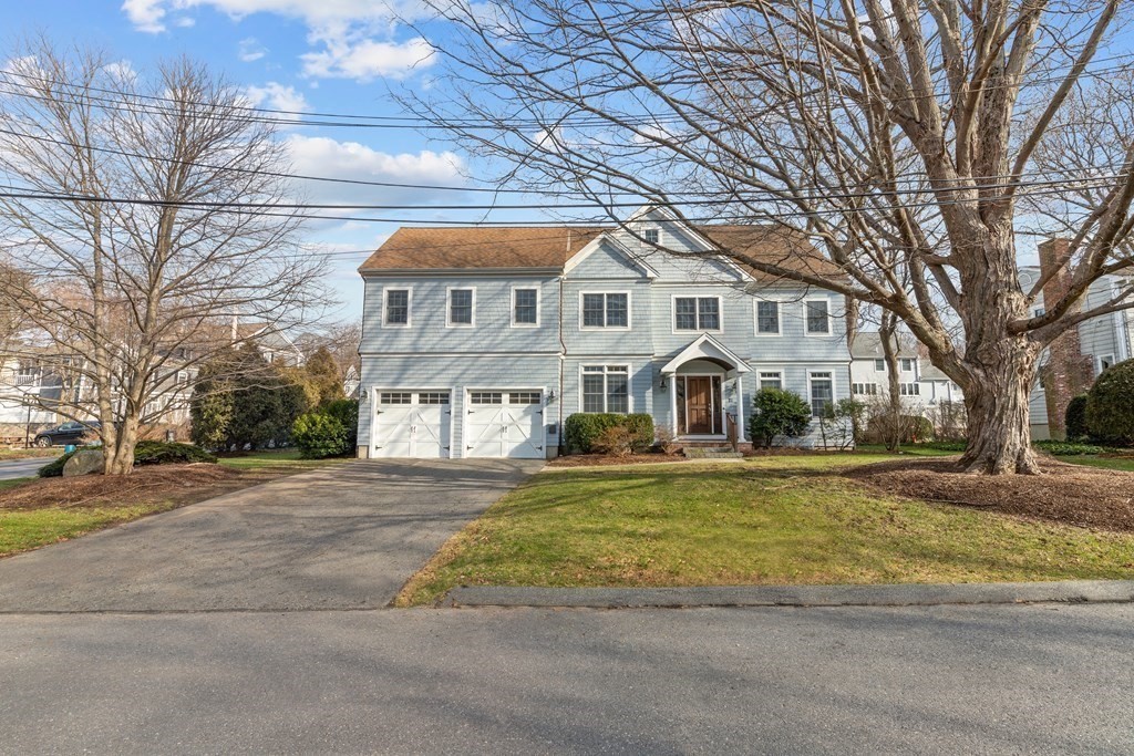 21 Ellison Road Lexington, MA 02421 - Photo 1 of 42 a front view of a house with a yard
