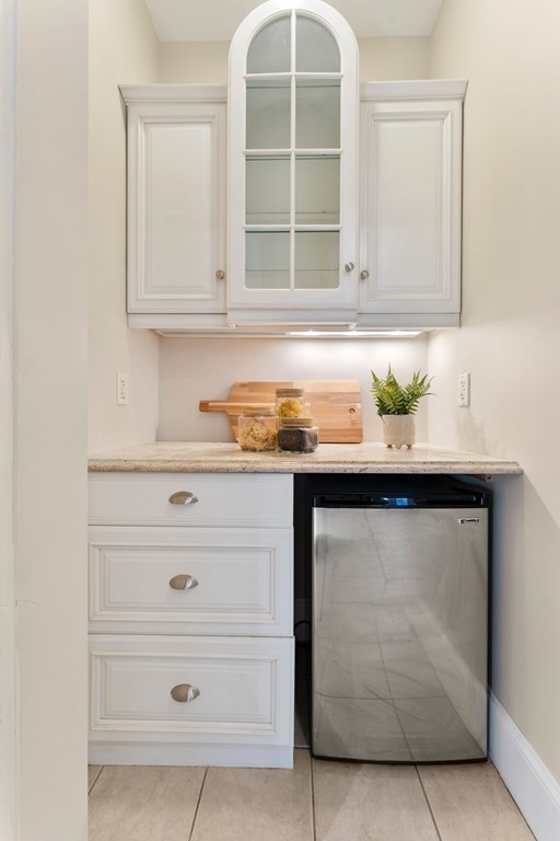 21 Ellison Road Lexington, MA 02421 - Photo 11 of 42 a bathroom with a sink and a mirror