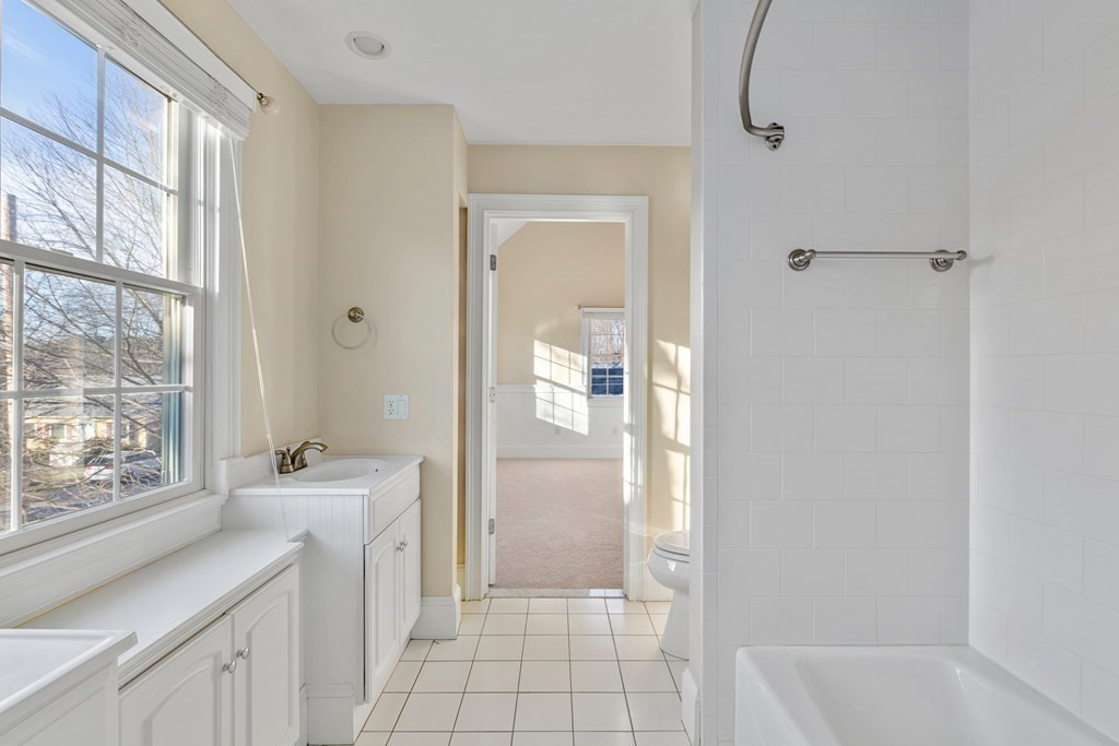 21 Ellison Road Lexington, MA 02421 - Photo 25 of 42 a bathroom with a sink a toilet and shower