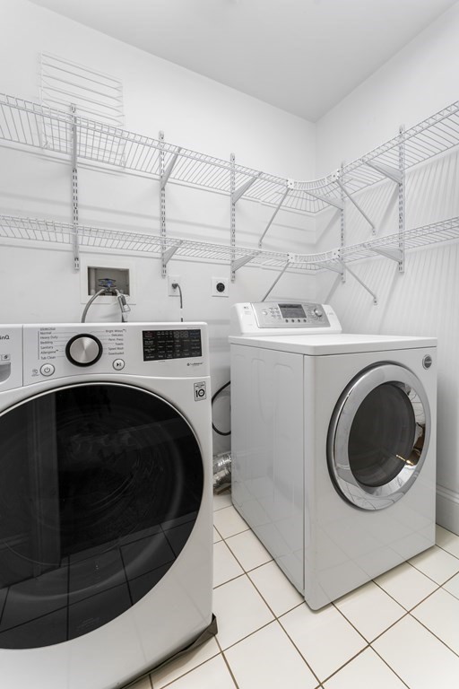21 Ellison Road Lexington, MA 02421 - Photo 29 of 42 a utility room with dryer and washer