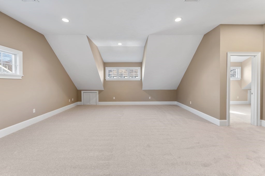 21 Ellison Road Lexington, MA 02421 - Photo 32 of 42 an empty room with windows and entrance