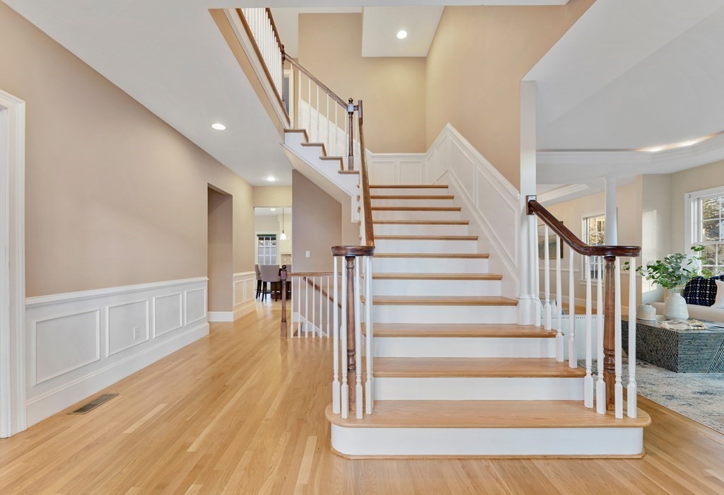 21 Ellison Road Lexington, MA 02421 - Photo 4 of 42 a view of entryway and hall with wooden floor