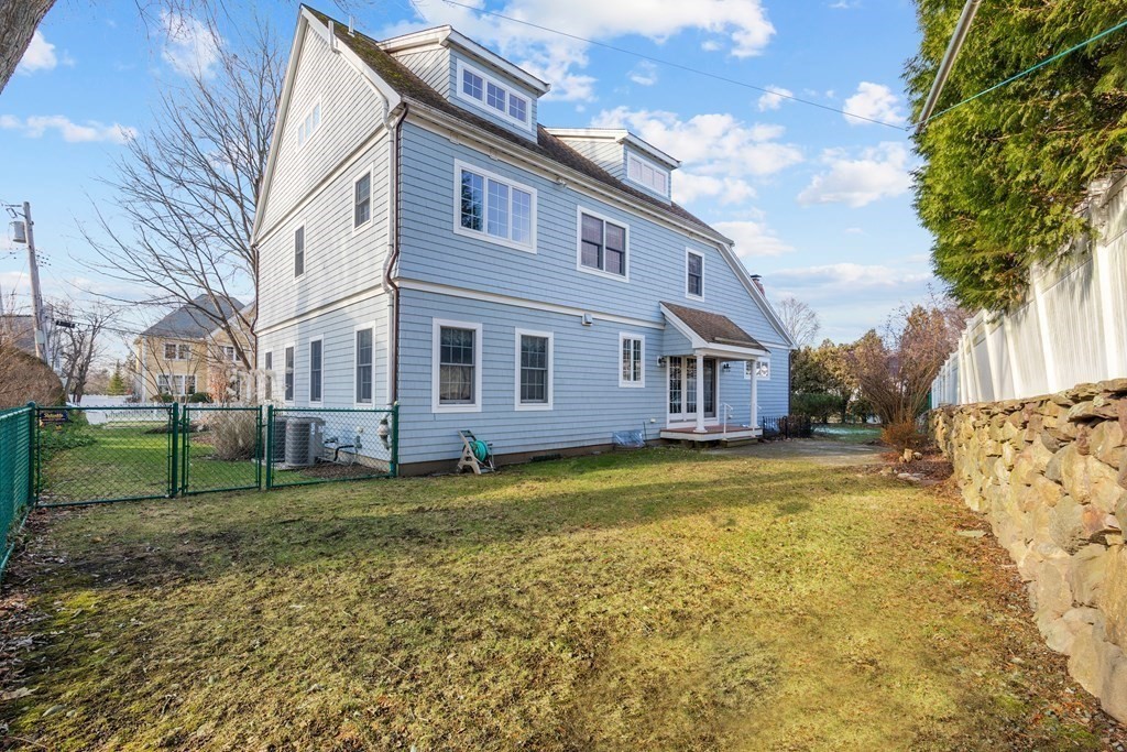21 Ellison Road Lexington, MA 02421 - Photo 42 of 42 a view of a house with a yard