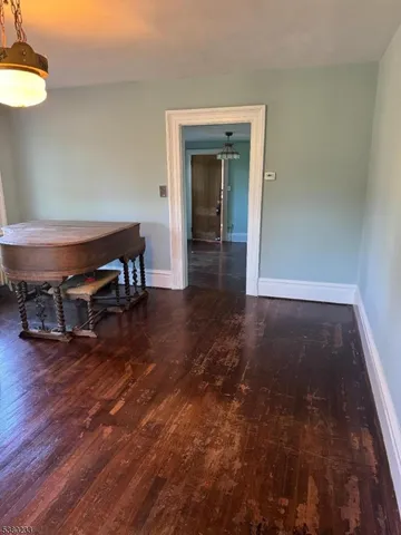a view of livingroom with furniture and wooden floor