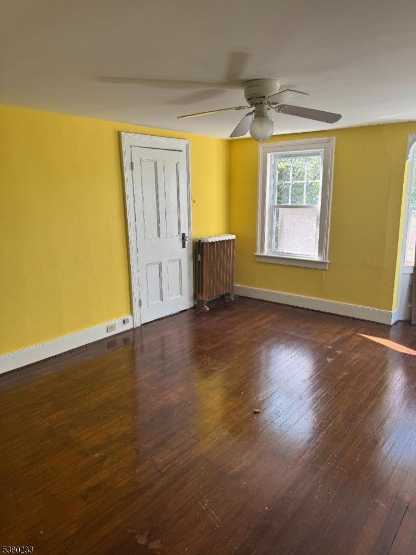 168 East Main Street Lebanon, NJ 08833 - Photo 23 of 26 a view of empty room with wooden floor and fan