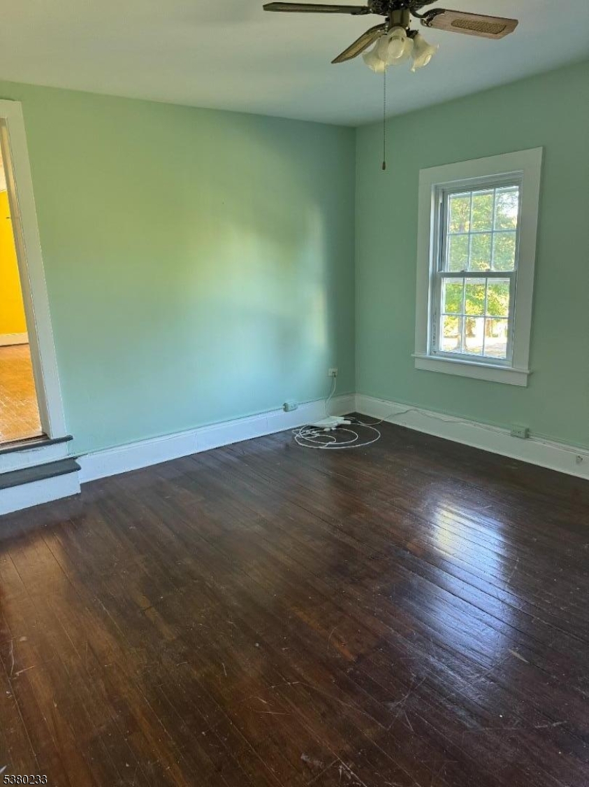 168 East Main Street Lebanon, NJ 08833 - Photo 24 of 26 an empty room with wooden floor and windows