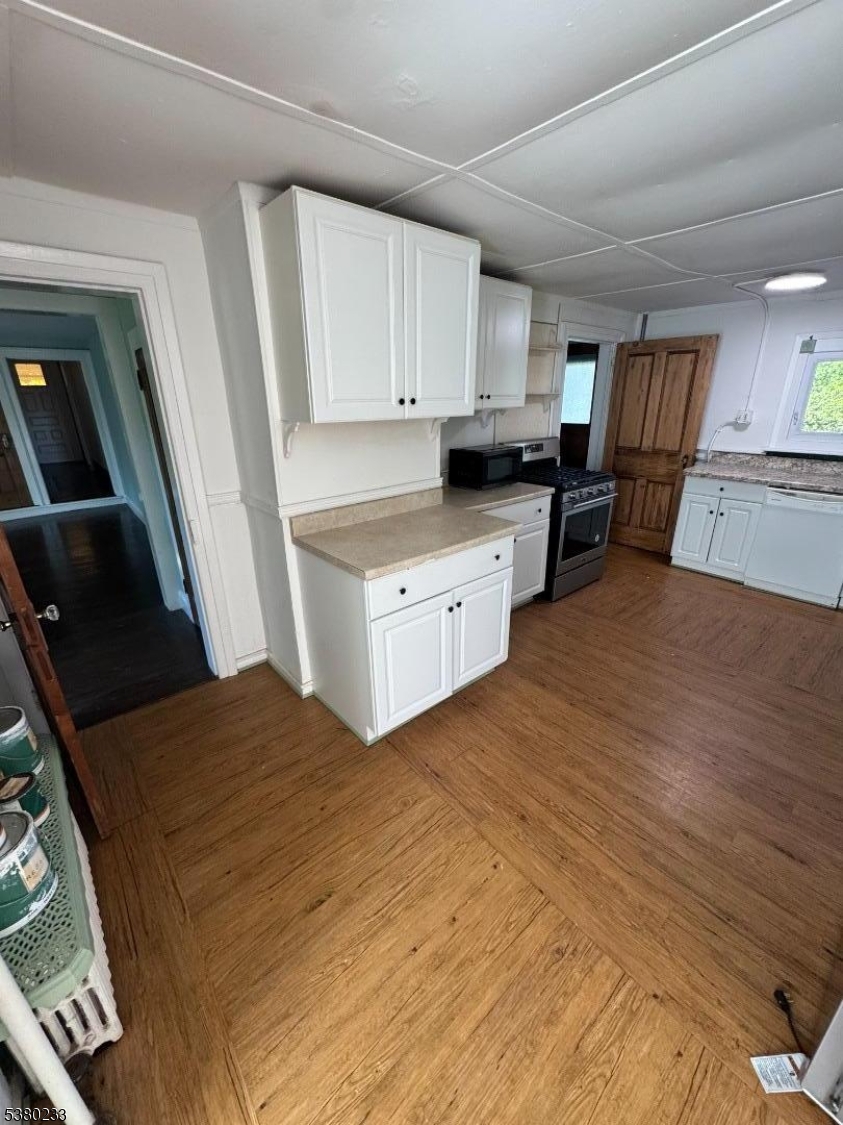 168 East Main Street Lebanon, NJ 08833 - Photo 9 of 26 a view of kitchen with microwave and cabinets