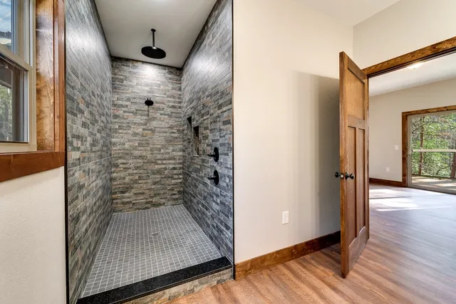 a view of wooden floor in an empty room