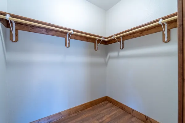 a view of a room with racks on the wall