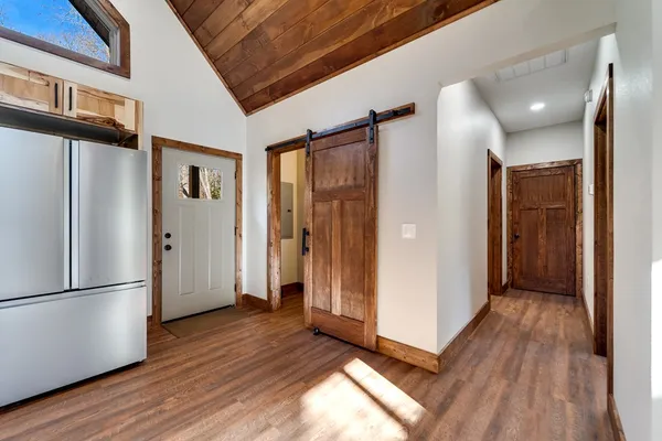 a view of wooden floor in an empty room