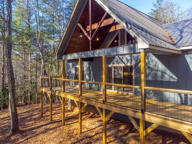 a view of a chairs and table in the patio