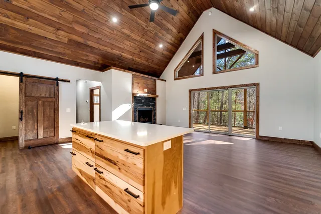 a view of an entryway with wooden floor