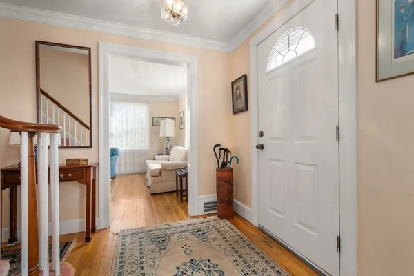 a living room with furniture and a rug