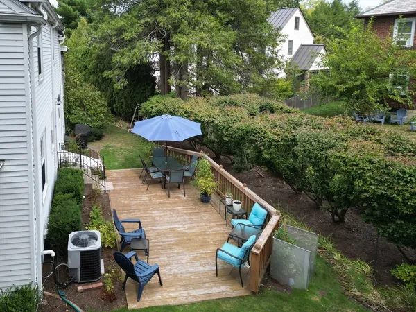 a view of a chairs and table in the patio