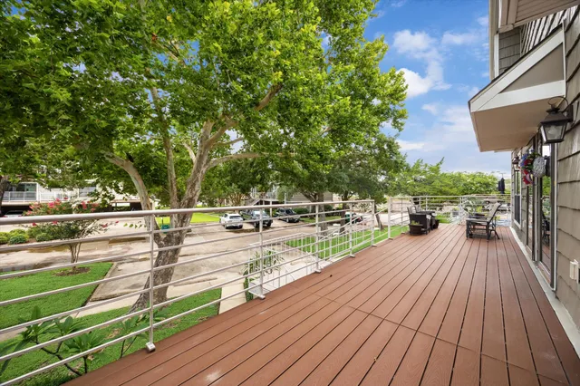 a view of a swimming pool with a patio and a yard