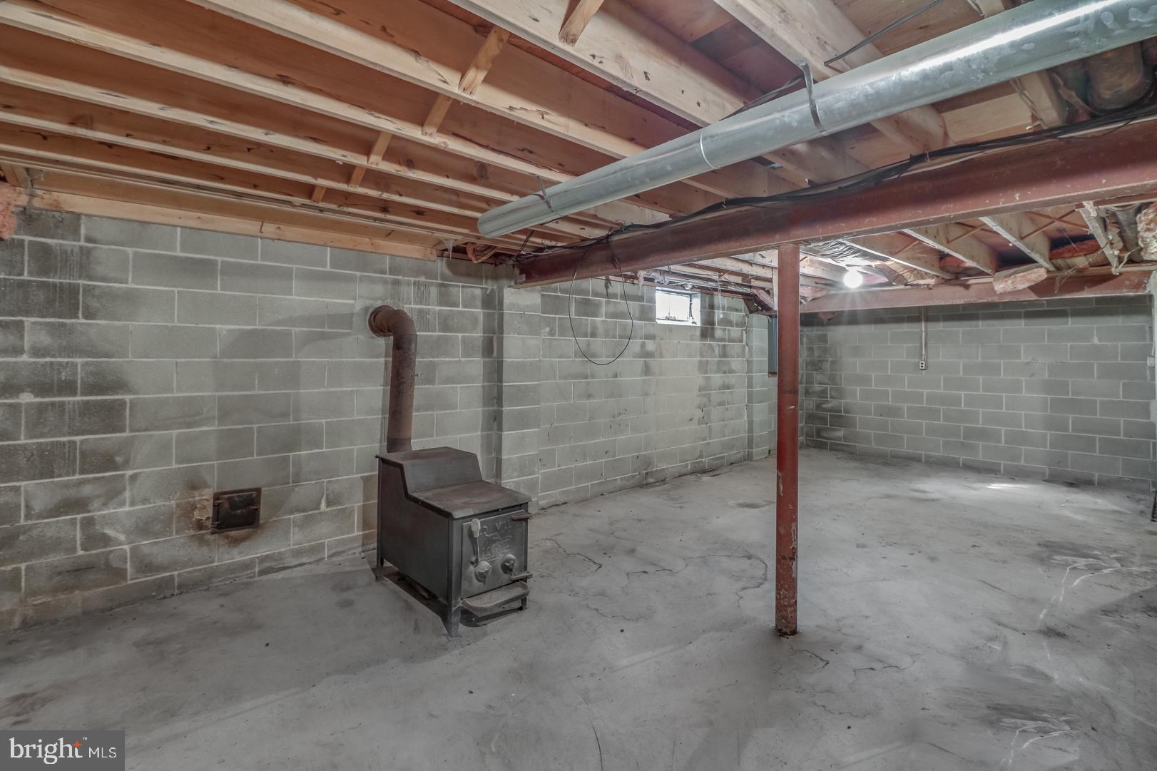 268 Saw Mill Road Townsend, DE 19734 - Photo 27 of 46 Basement has a 2nd wood stove