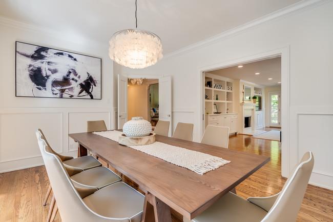 280 Ridgeway Road Woodside, CA 94062 - Photo 15 of 65 a view of a dining room with furniture and wooden floor