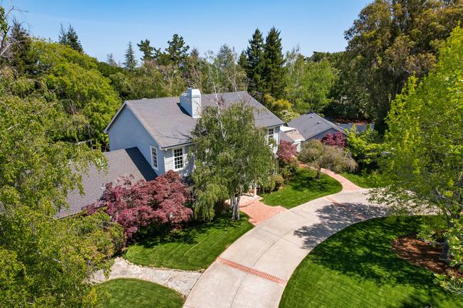 280 Ridgeway Road Woodside, CA 94062 - Photo 2 of 65 a view of a house with a yard and garden