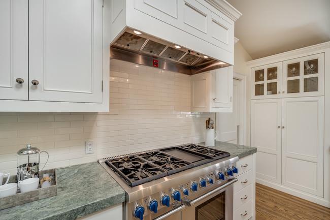 280 Ridgeway Road Woodside, CA 94062 - Photo 24 of 65 a stove top oven sitting inside of a kitchen