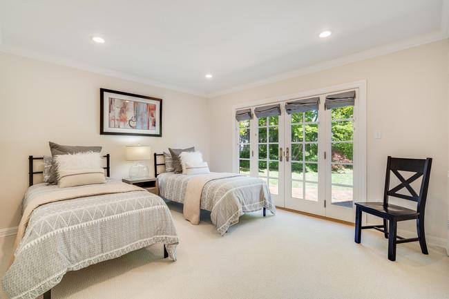 280 Ridgeway Road Woodside, CA 94062 - Photo 34 of 65 a spacious bedroom with two beds and a large window
