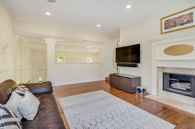 280 Ridgeway Road Woodside, CA 94062 - Photo 38 of 65 a living room with furniture and a flat screen tv