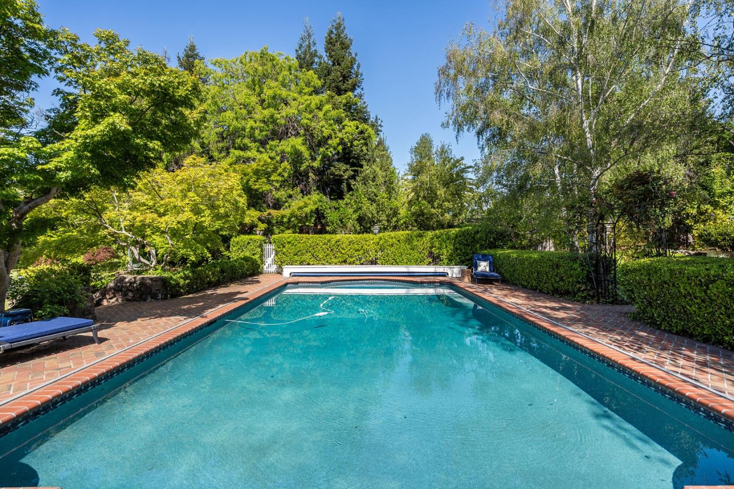280 Ridgeway Road Woodside, CA 94062 - Photo 47 of 65 a view of a mini pool with an outdoor seating