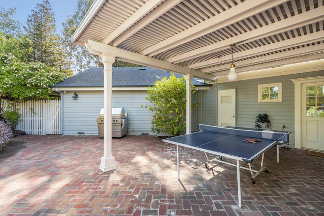 280 Ridgeway Road Woodside, CA 94062 - Photo 50 of 65 a view of house with backyard and sitting area