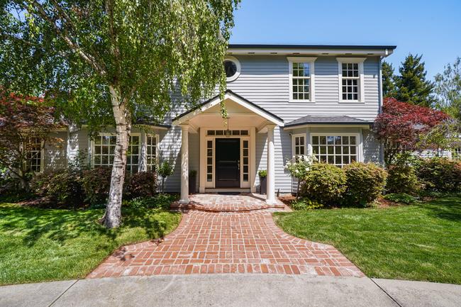 280 Ridgeway Road Woodside, CA 94062 - Photo 5 of 65 a front view of a house with yard and green space