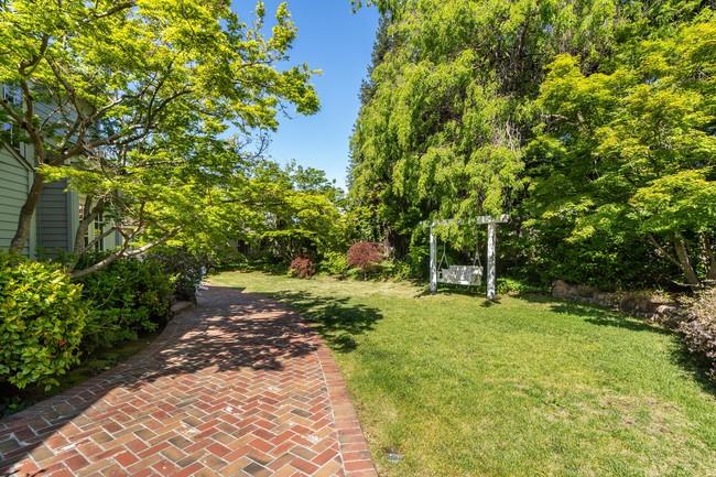 280 Ridgeway Road Woodside, CA 94062 - Photo 52 of 65 a backyard of a house with lots of green space