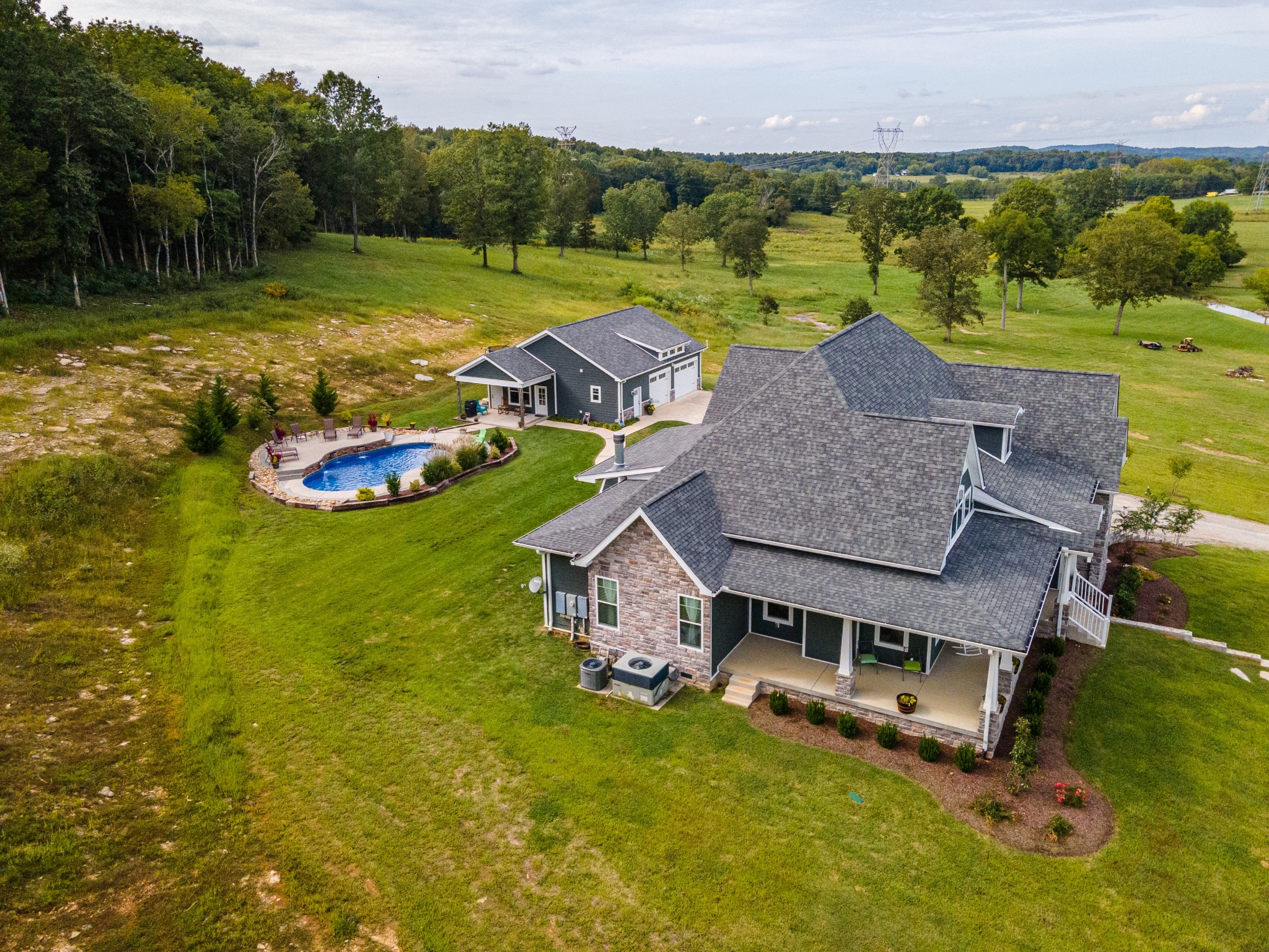 2740 Old Shannon Road Lebanon, TN 37090 - Photo 2 of 50 an aerial view of a house with swimming pool garden and lake view
