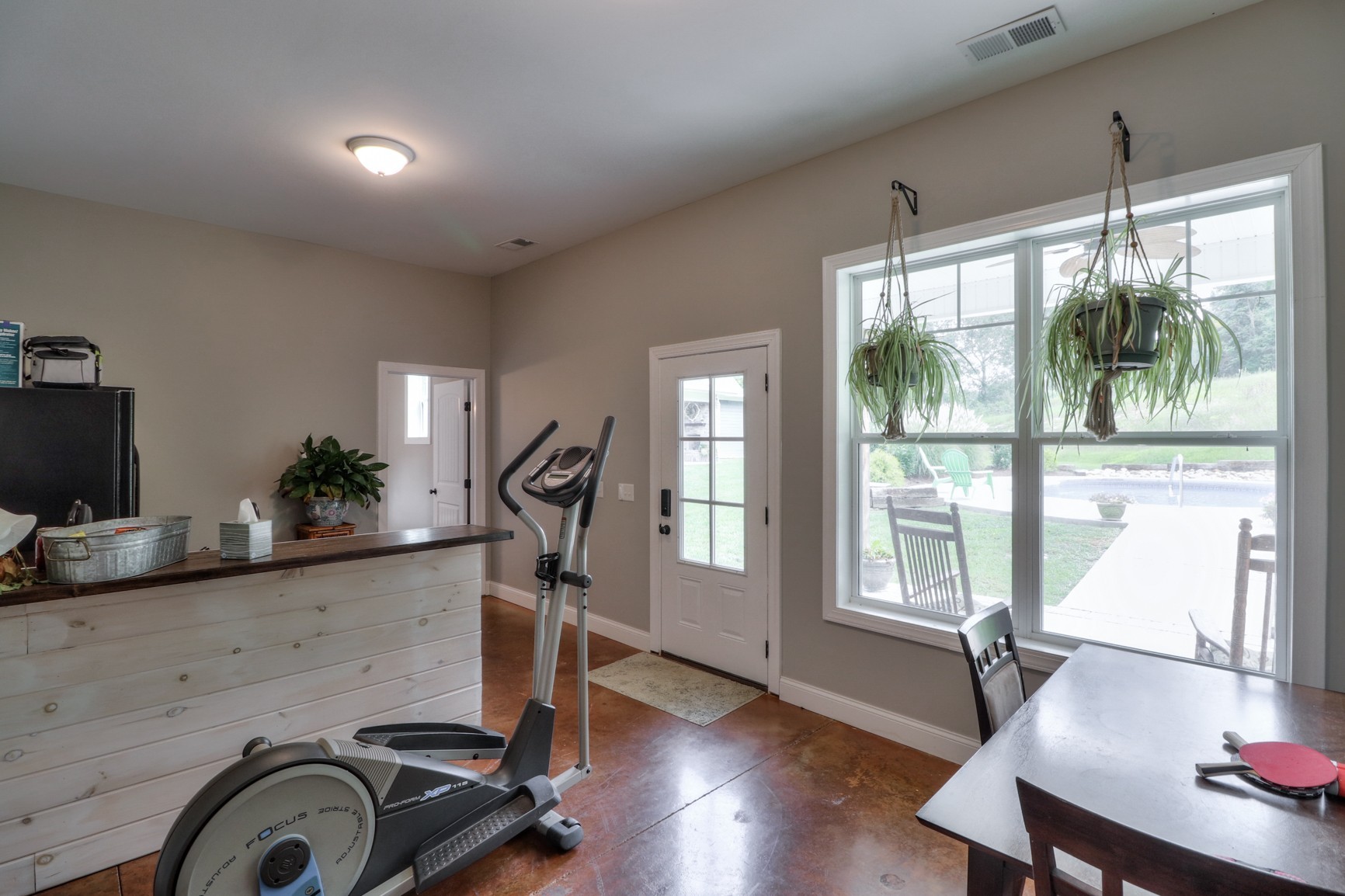 2740 Old Shannon Road Lebanon, TN 37090 - Photo 16 of 50 a room with gym equipment and a large window