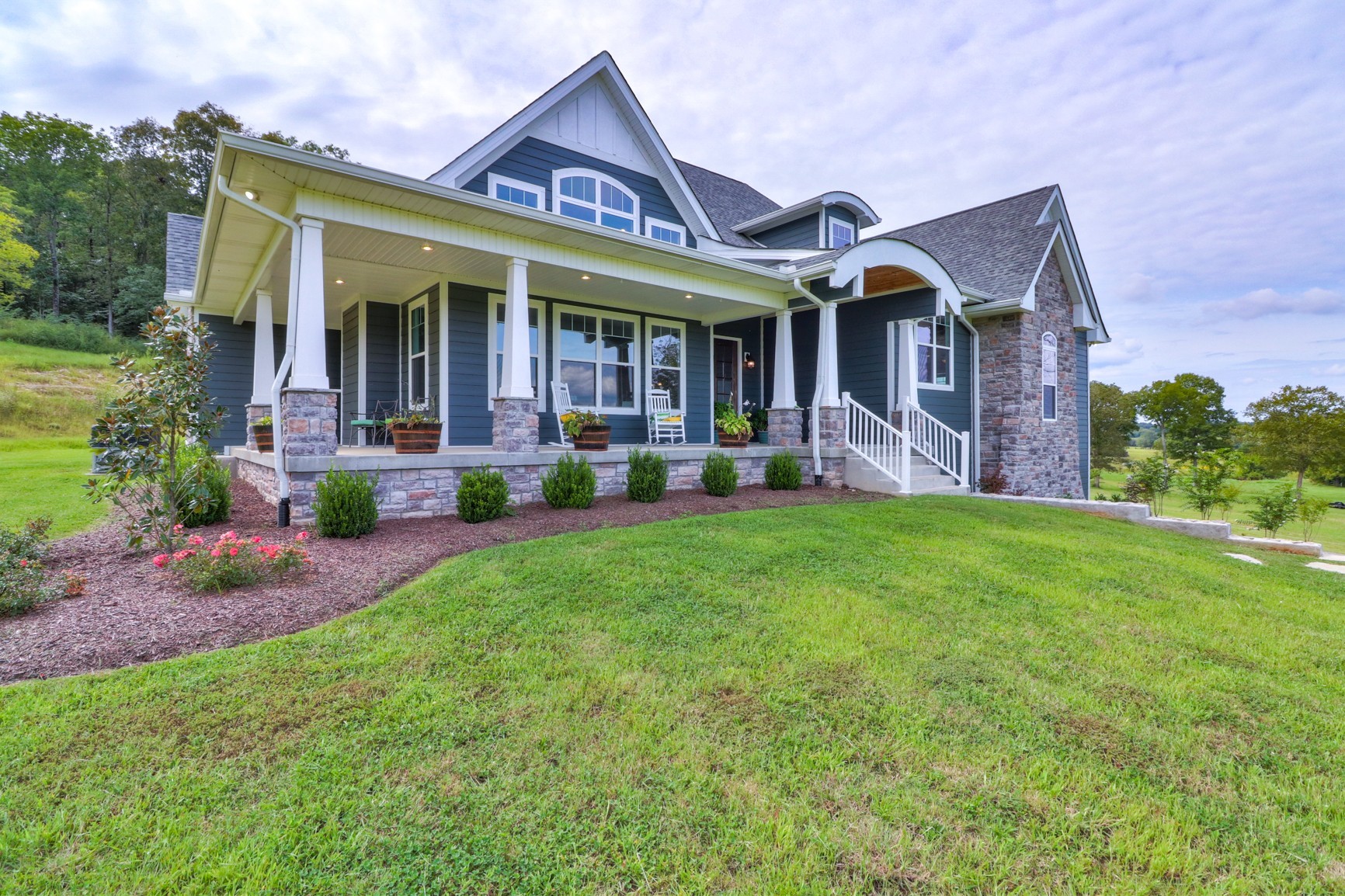 2740 Old Shannon Road Lebanon, TN 37090 - Photo 3 of 50 a front view of a house with garden and porch
