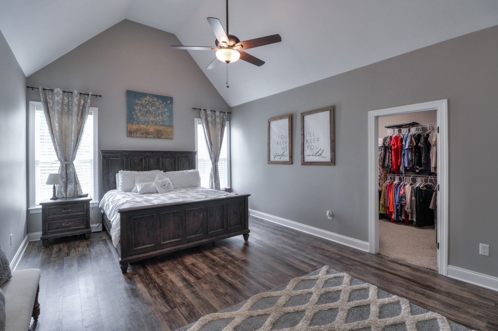 2740 Old Shannon Road Lebanon, TN 37090 - Photo 32 of 50 a bedroom with a bed and a chandelier