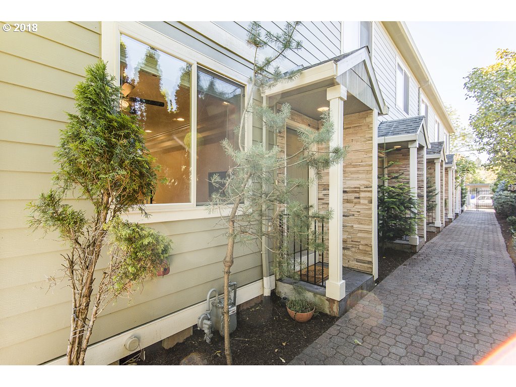 1126 Northeast 60th Avenue Portland, OR 97213 - Photo 3 of 25 a view of entryway with a tree