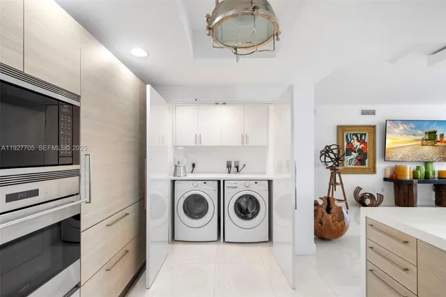 a kitchen with a stove and cabinets