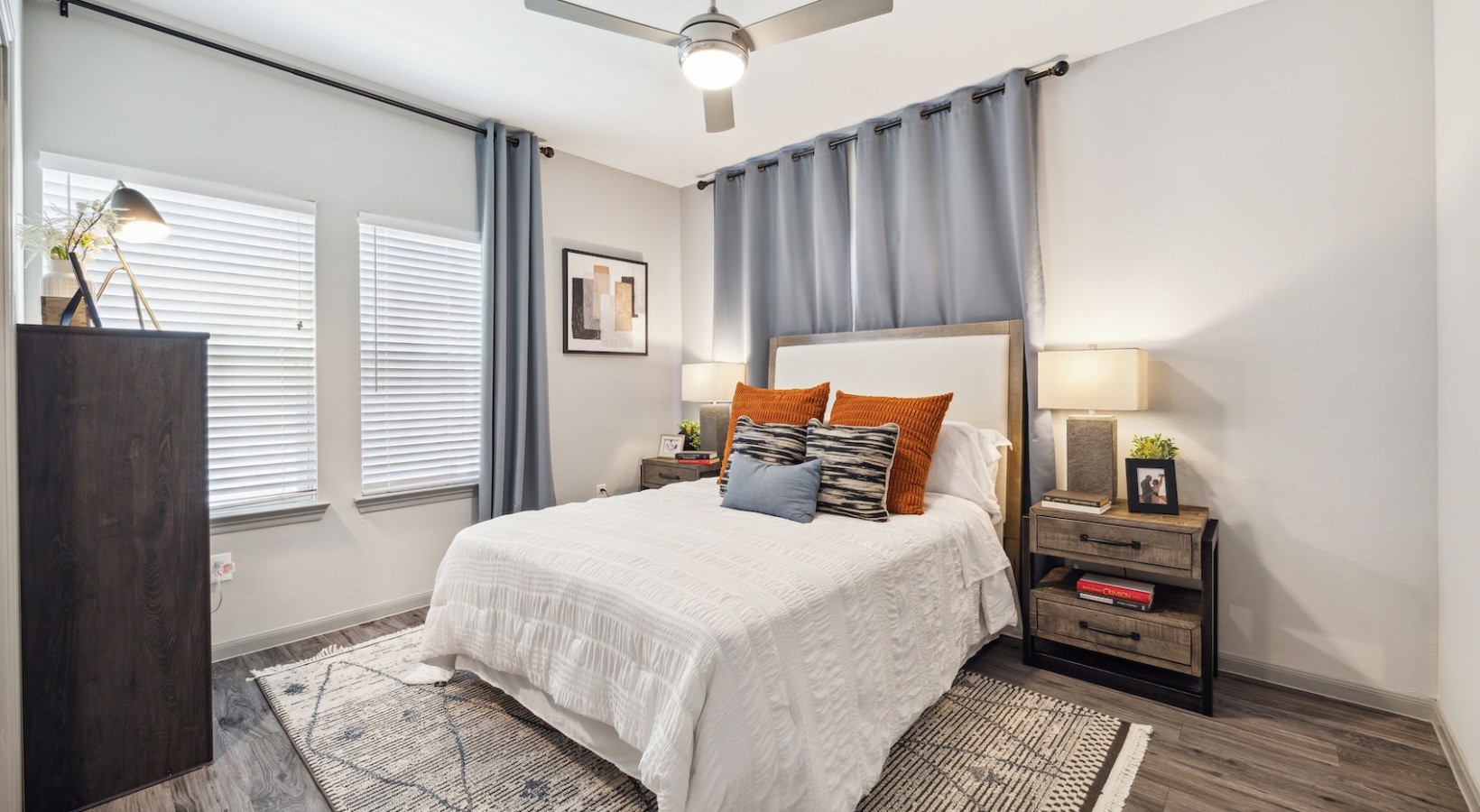 12752 North Houston Rosslyn Road, Unit 932 Houston, TX 77086 - Photo 5 of 14 a bedroom with a bed and a chandelier