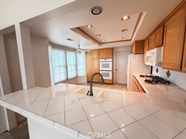 1022 Regis Way Tustin, CA 92780 - Photo 12 of 43 Kitchen counter for eating