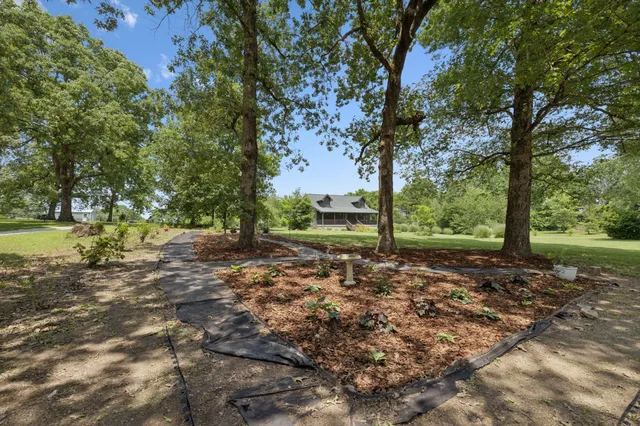 a view of a house with a big yard